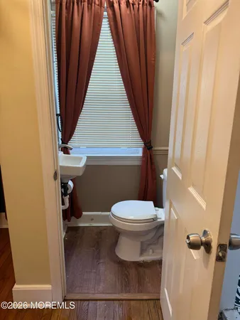 a kitchen with a sink stove and microwave