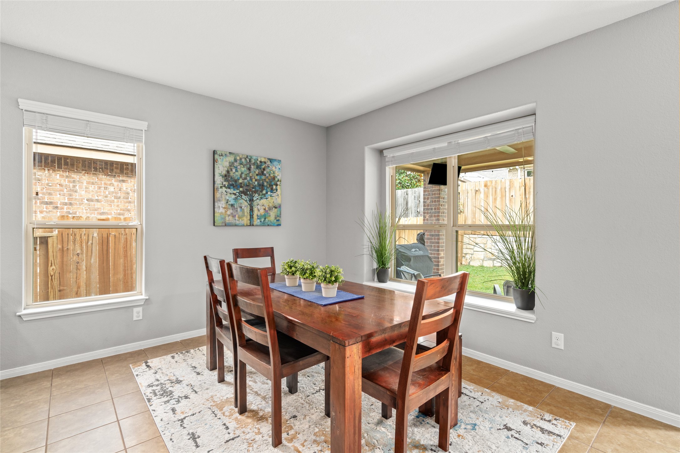 1071 Cedar Lake Court Conroe, TX 77384 - Photo 11 of 43 a view of a dining room with furniture window and outside view