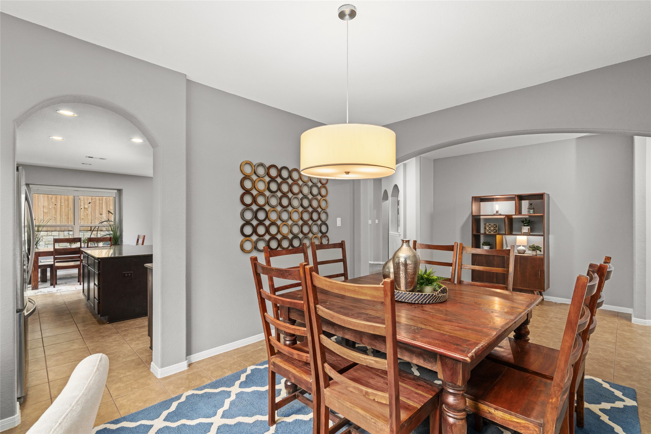 1071 Cedar Lake Court Conroe, TX 77384 - Photo 12 of 43 a view of a dining room with furniture