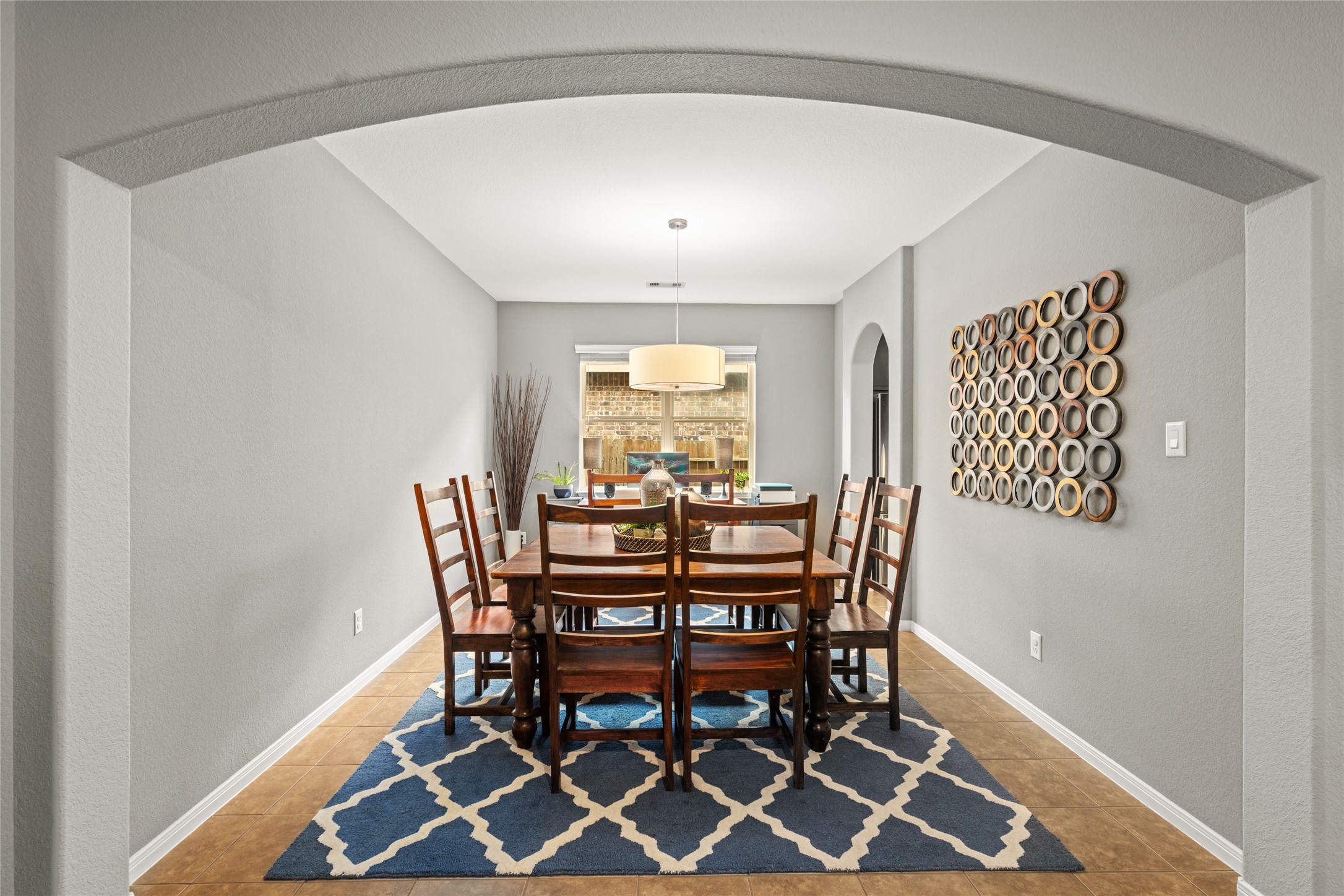 1071 Cedar Lake Court Conroe, TX 77384 - Photo 13 of 43 a dining room with furniture and window