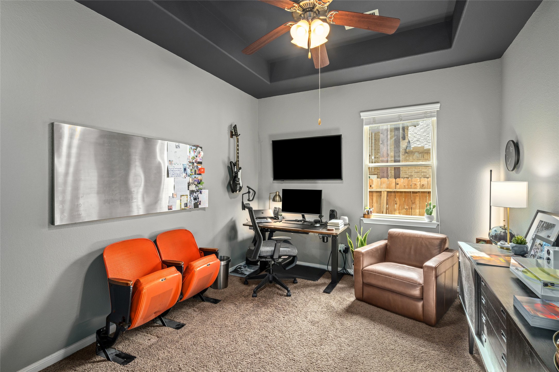 1071 Cedar Lake Court Conroe, TX 77384 - Photo 14 of 43 a living room with furniture and a flat screen tv