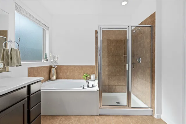 a bathroom with a bathtub and a sink