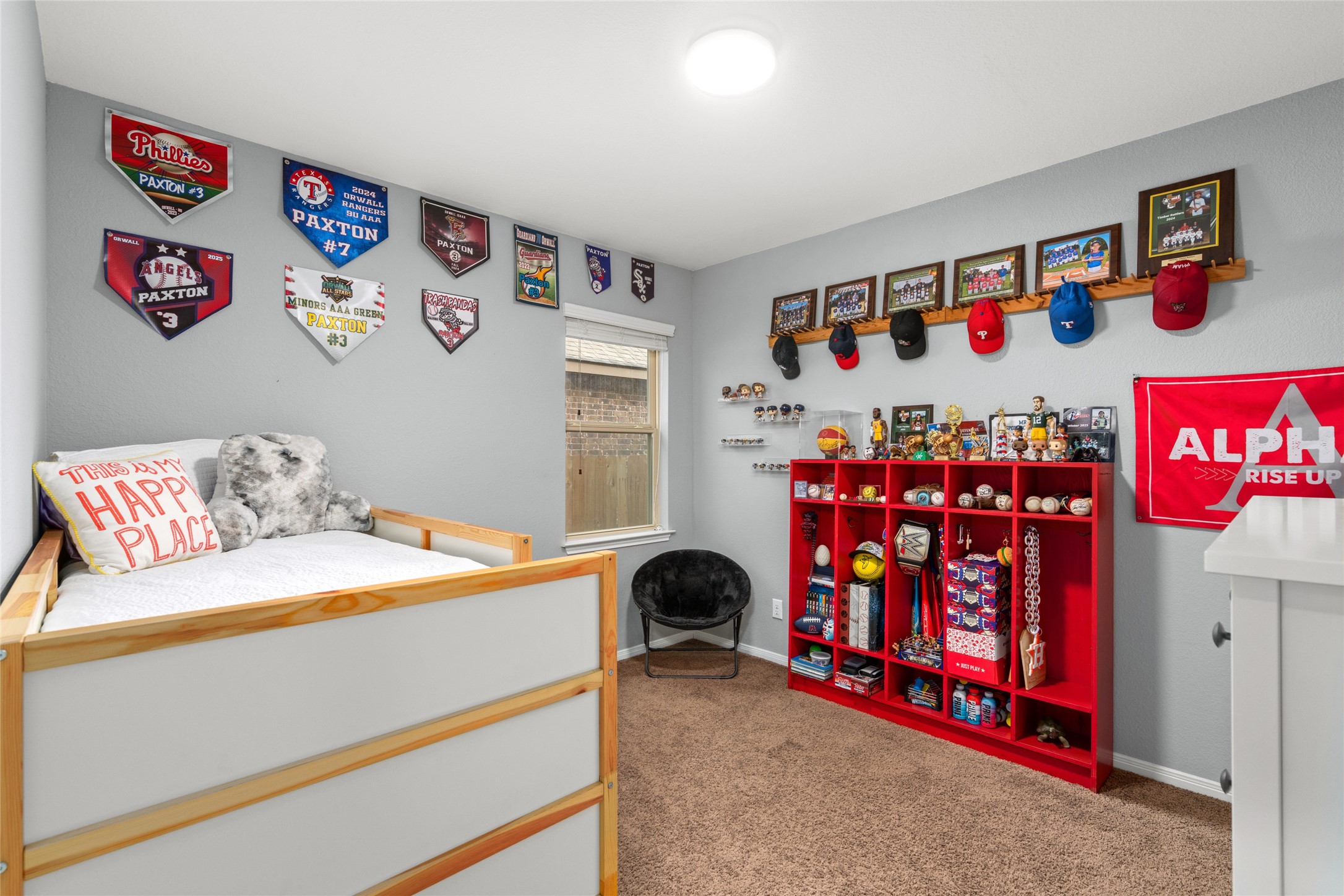 1071 Cedar Lake Court Conroe, TX 77384 - Photo 20 of 43 a bedroom with a bed and a window