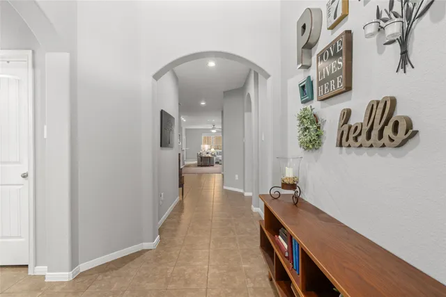 a hallway with wooden floor