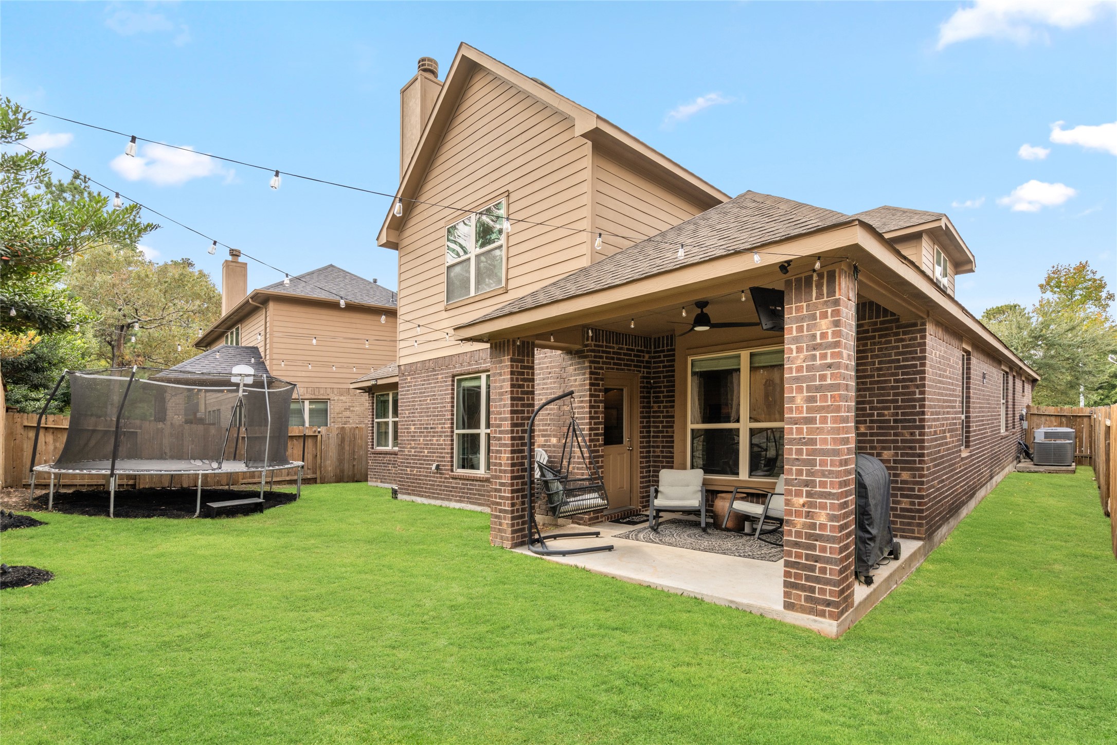 1071 Cedar Lake Court Conroe, TX 77384 - Photo 29 of 43 a view of a house with backyard