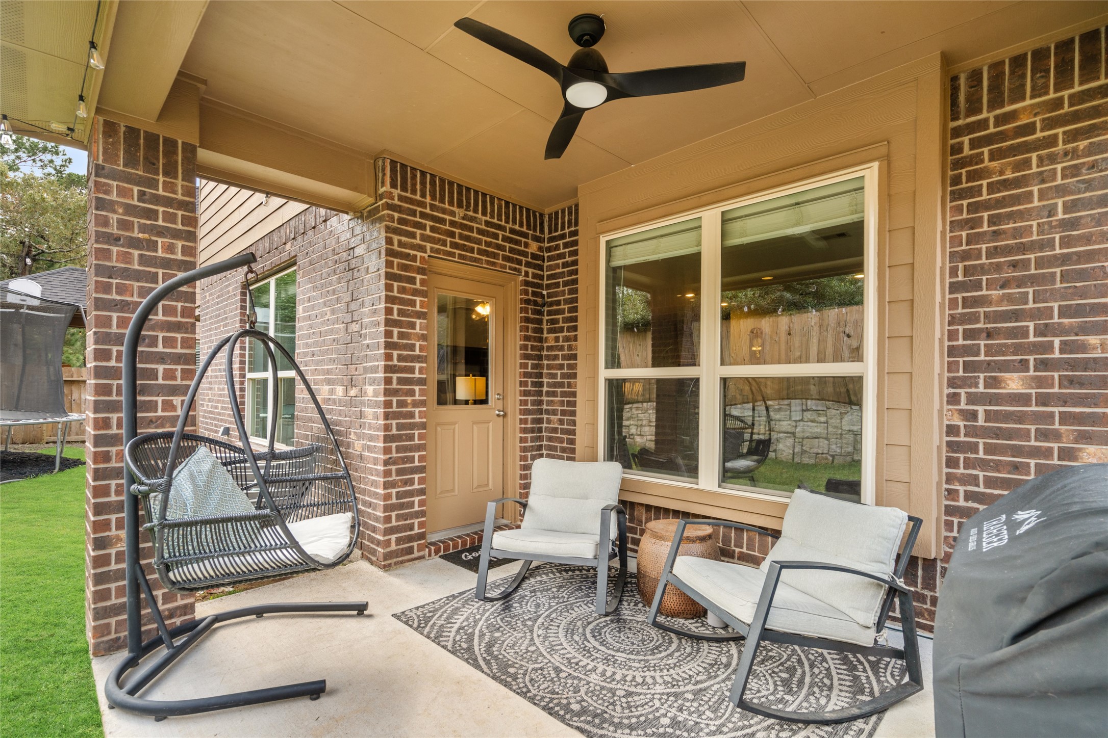 1071 Cedar Lake Court Conroe, TX 77384 - Photo 30 of 43 a building outdoor space with patio furniture
