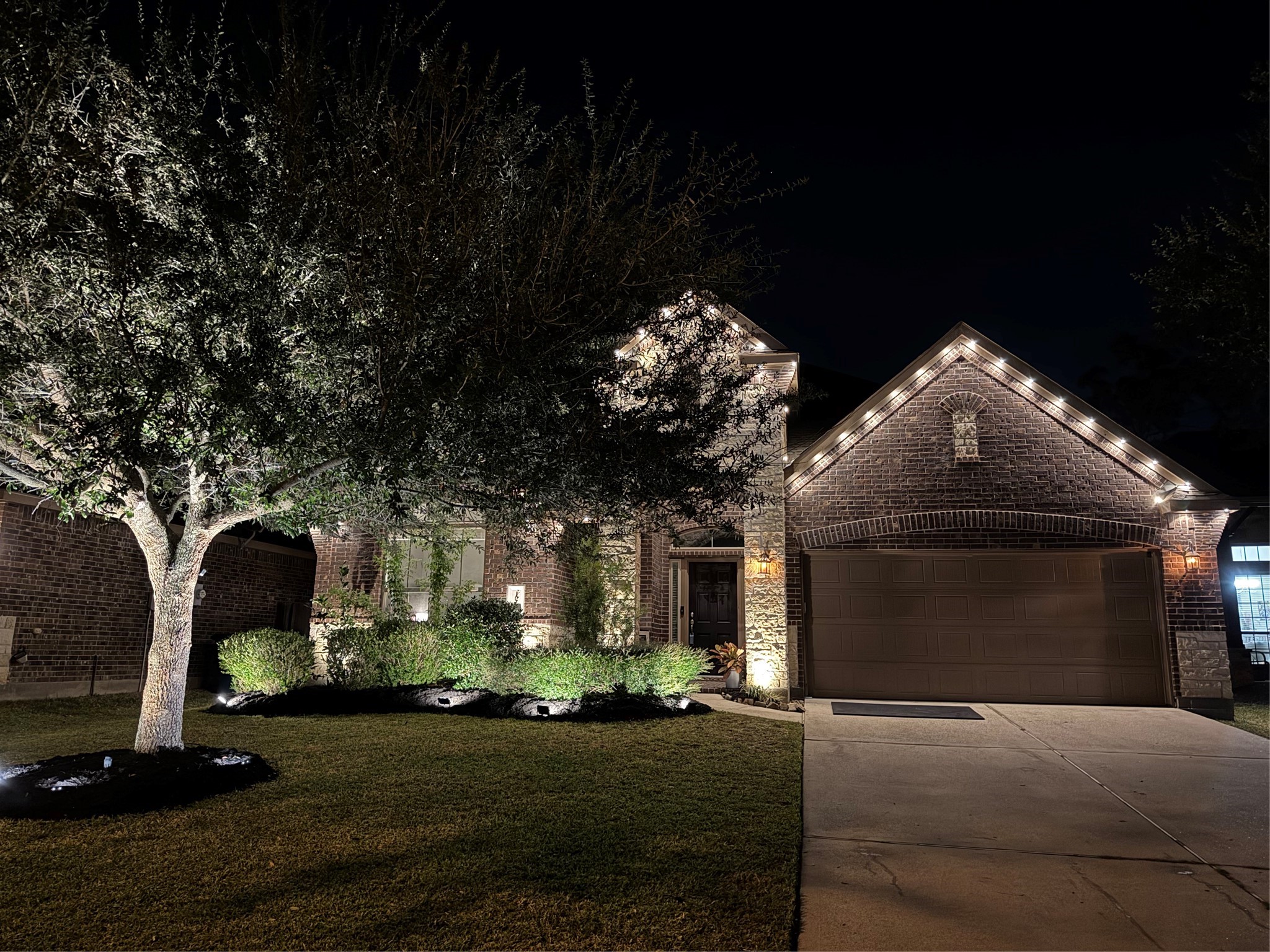 1071 Cedar Lake Court Conroe, TX 77384 - Photo 40 of 43 a front view of a house with garden