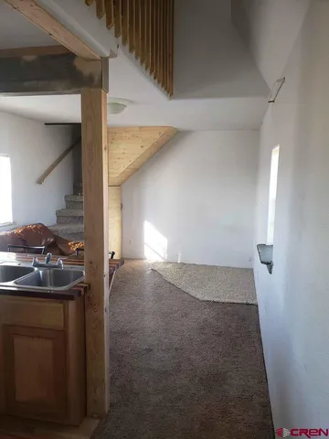 a view of a livingroom with a sink