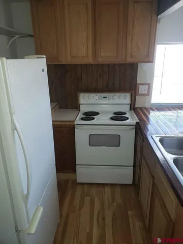 a workspace with furniture and window