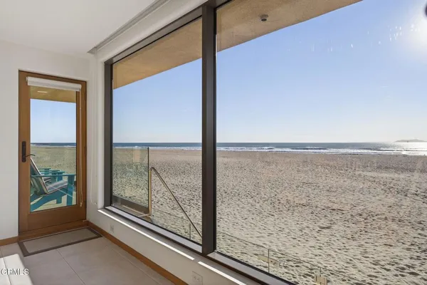 a bathroom with a tub and shower