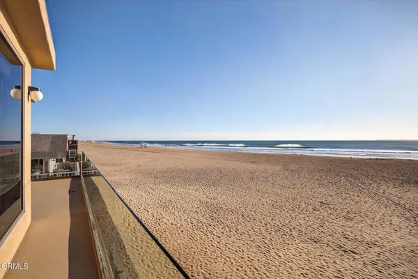 a bathroom with a granite countertop sink mirror and vanity