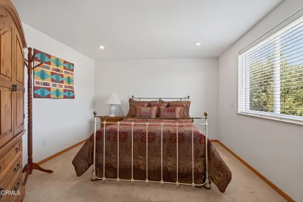 a bathroom with a sink double vanity and a mirror