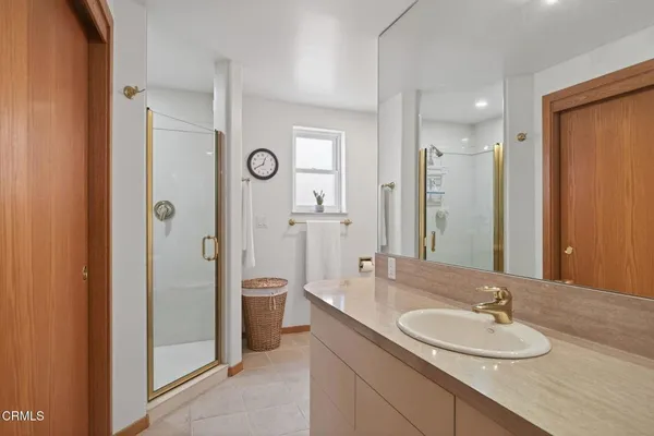a view of chairs and table in a room