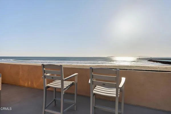 a view of multiple houses with a city street