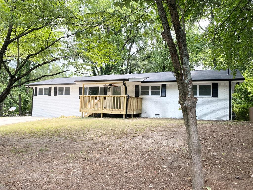 1610 Rey Street Northwest Atlanta, GA 30318 - Photo 1 of 1 front view of a house with a yard