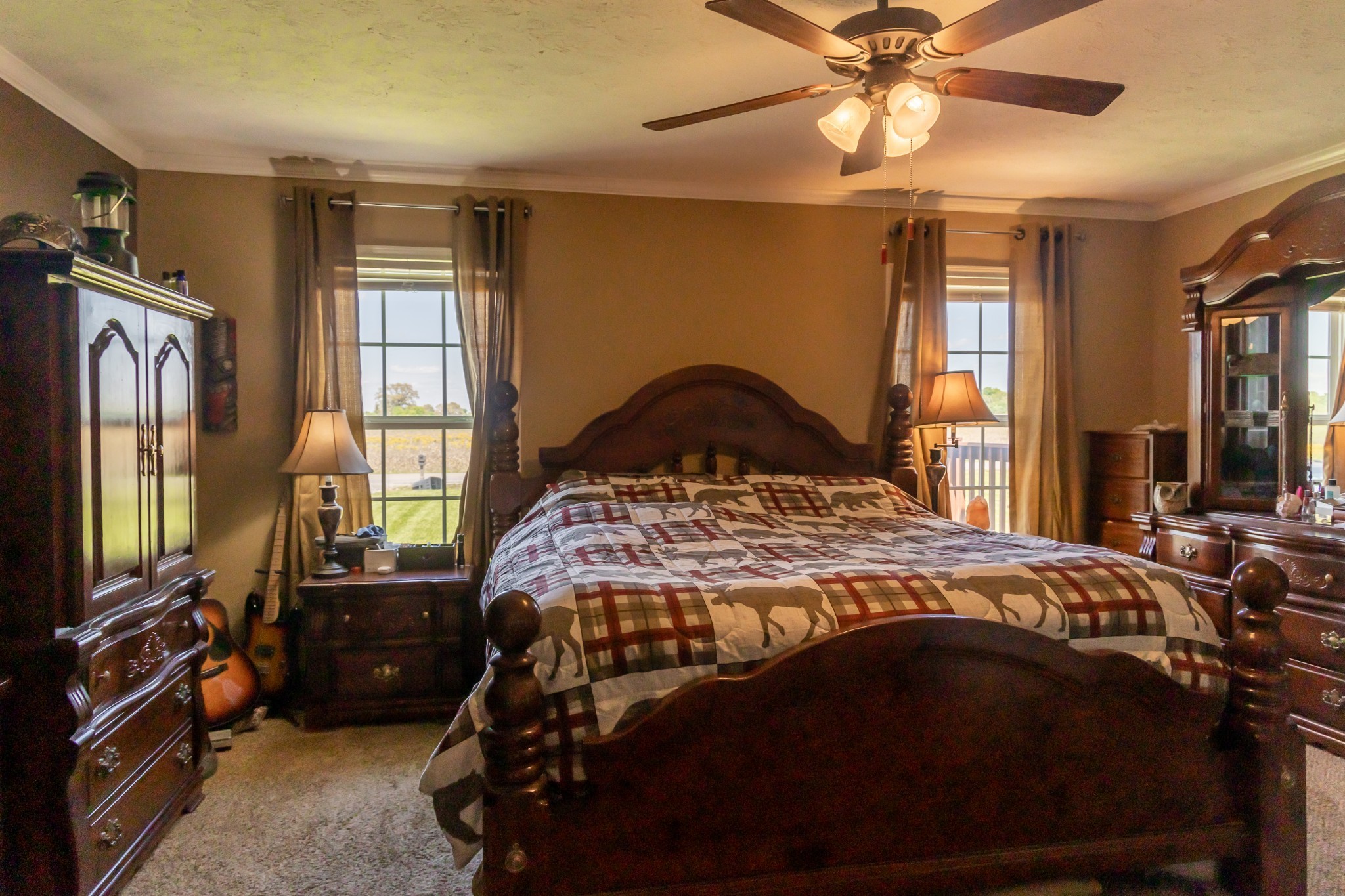 783 White Road Portland, TN 37148 - Photo 12 of 20 a bedroom with a bed and a flat tv screen on dresser