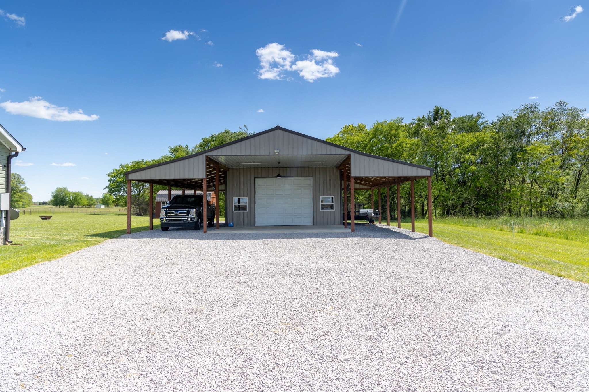 783 White Road Portland, TN 37148 - Photo 18 of 20 a view of a house with backyard and patio