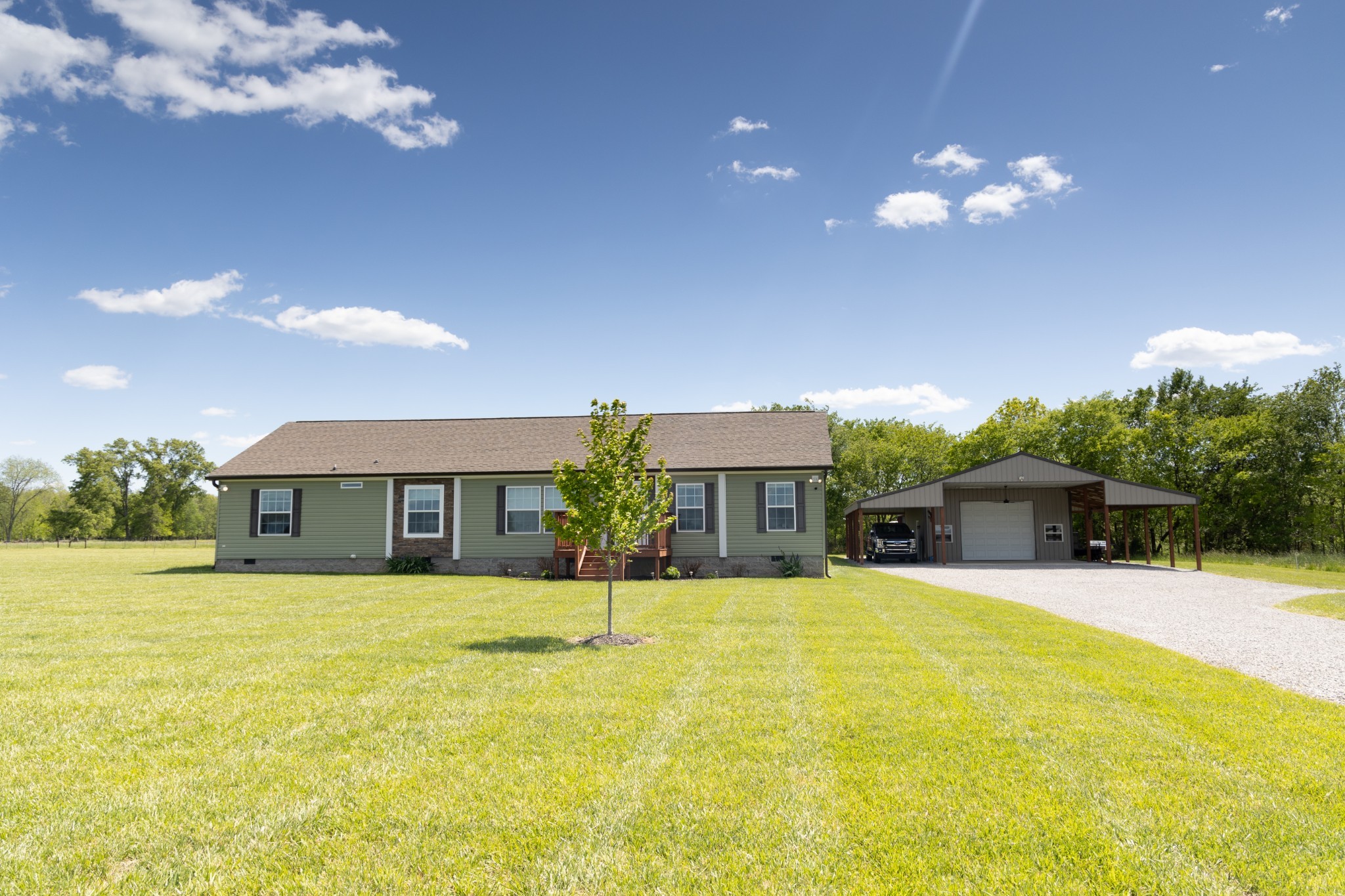 783 White Road Portland, TN 37148 - Photo 2 of 20 a view of house with swimming pool