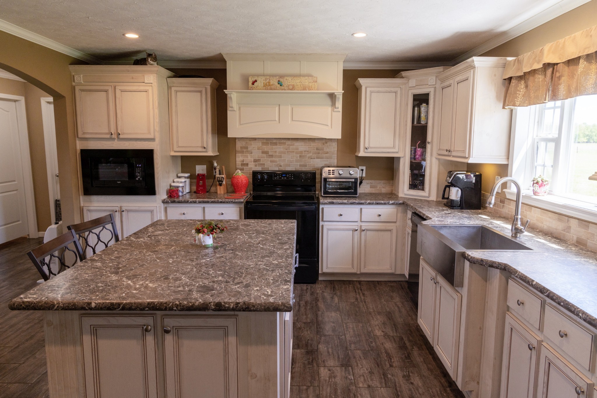 783 White Road Portland, TN 37148 - Photo 8 of 20 a kitchen with a sink stove and cabinets