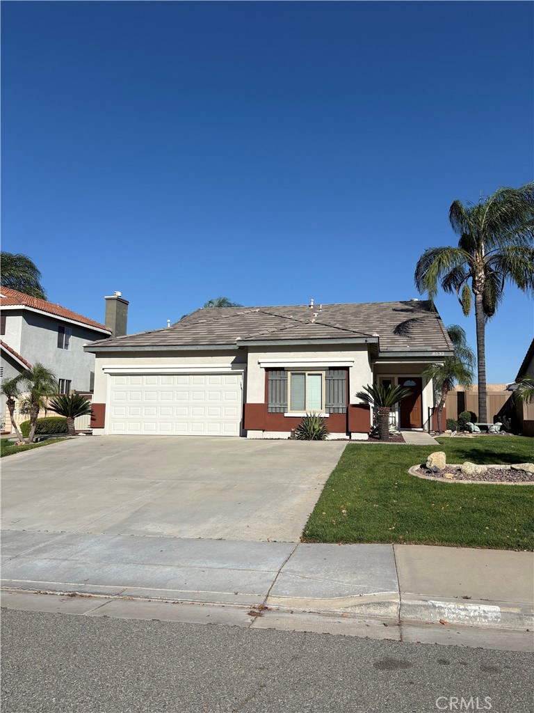 8532 Orchard Park Drive Riverside, CA 92508 - Photo 1 of 2 a view of a house with a yard and parking space