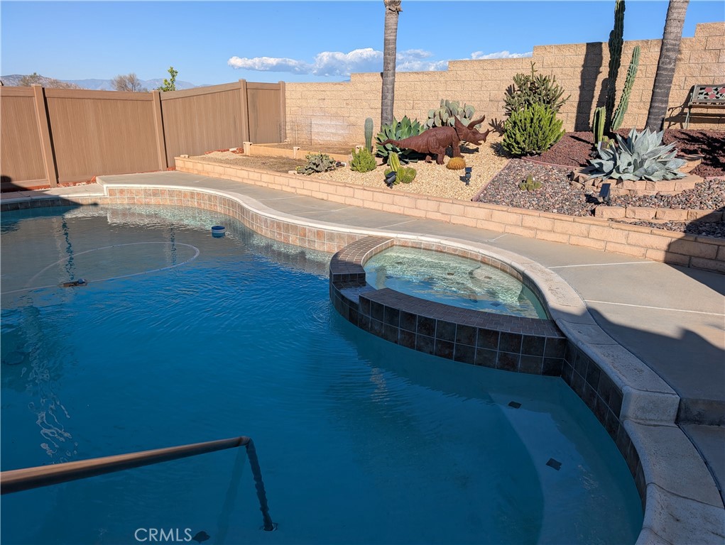 8532 Orchard Park Drive Riverside, CA 92508 - Photo 2 of 2 a view of a kitchen with a sink and living room