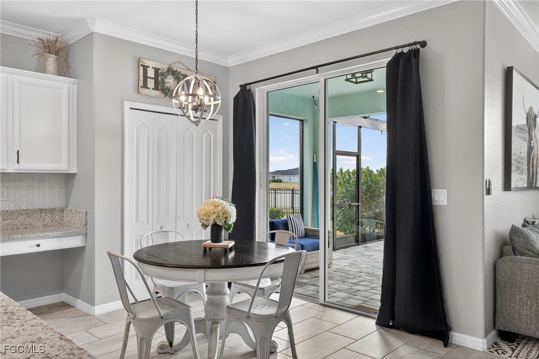 43325 Waymark Place Punta Gorda, FL 33982 - Photo 18 of 49 a view of a dining room with furniture window and outside view