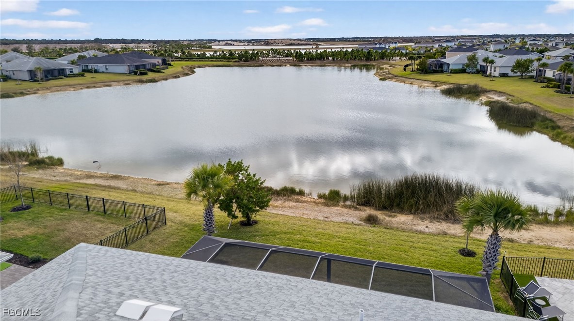 43325 Waymark Place Punta Gorda, FL 33982 - Photo 39 of 49 a view of a lake with a yard
