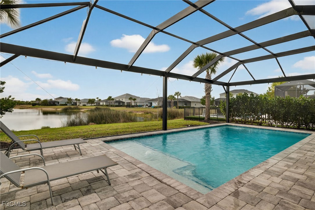 43325 Waymark Place Punta Gorda, FL 33982 - Photo 5 of 49 a view of swimming pool with outdoor seating and plants