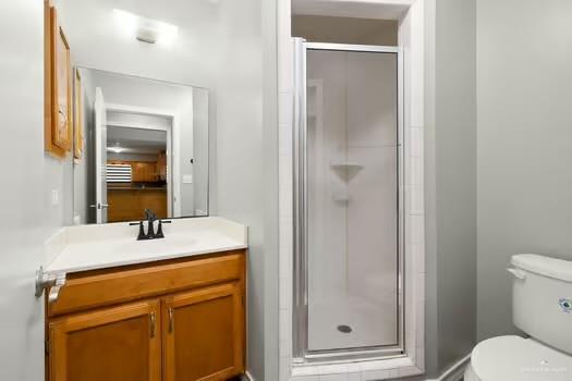 1403 Tierra Rica Avenue Alamo, TX 78516 - Photo 11 of 13 a bathroom with a granite countertop sink toilet and shower