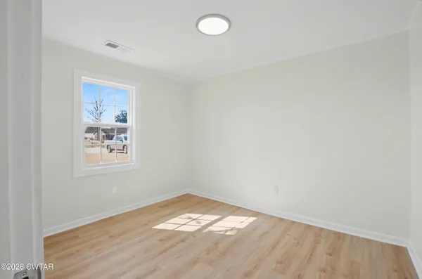 an empty room with a window