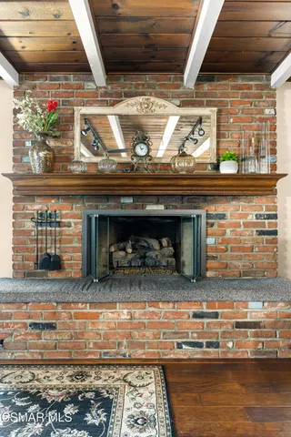a fireplace with wooden floor
