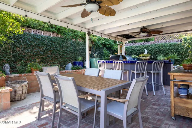 a view of a table and chairs in patio