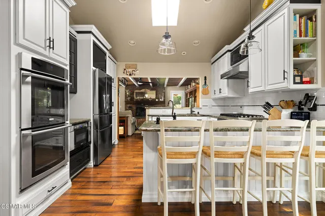 a kitchen with granite countertop lots of counter top space