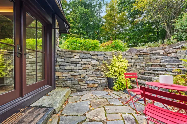 a view of yard with an outdoor seating