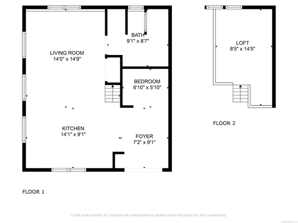 an aerial view of a house with a yard and outdoor seating