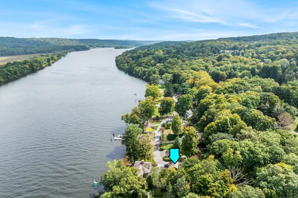 a view of a lake with a yard