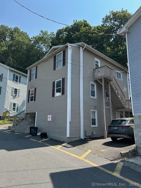 47 Gilbert Street, Unit 1 Derby, CT 06418 - Photo 2 of 21 a view of a house with a patio