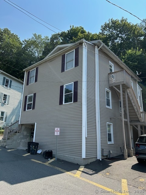 47 Gilbert Street, Unit 1 Derby, CT 06418 - Photo 3 of 21 a front view of a house with a yard
