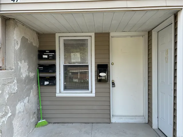 a kitchen with stainless steel appliances granite countertop a sink and a stove