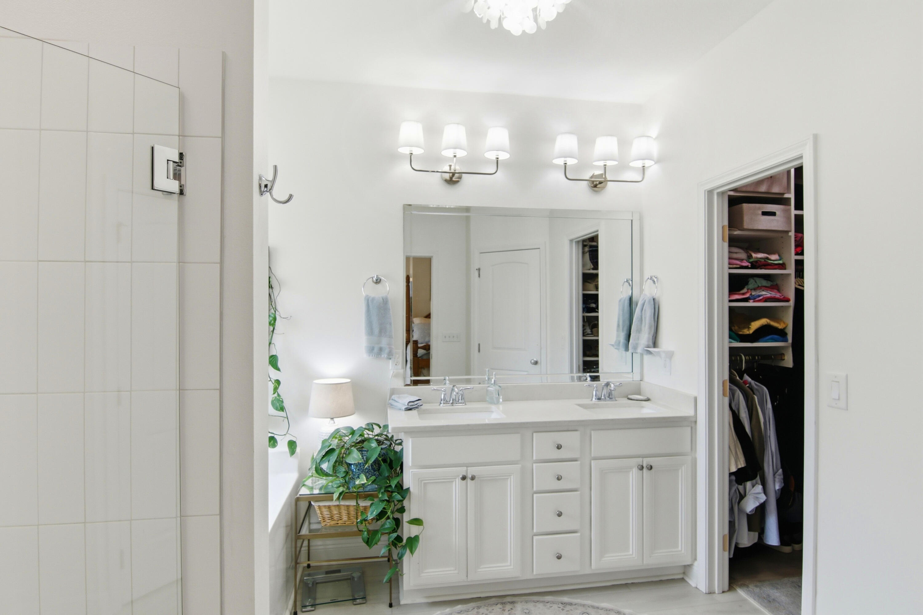 169 Marsh Landing North Freeport, FL 32439 - Photo 20 of 44 a bathroom with a double vanity sink and a mirror