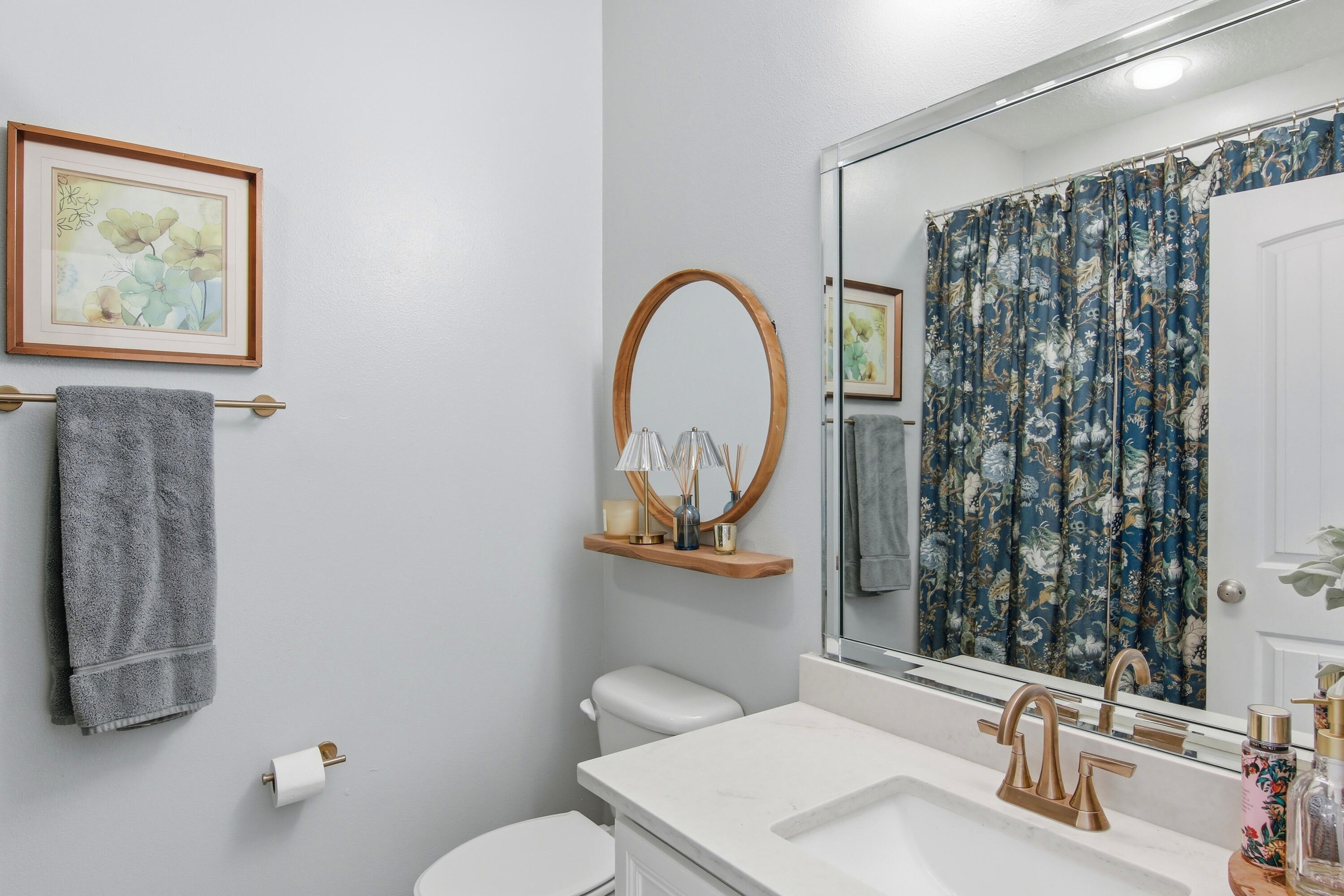 169 Marsh Landing North Freeport, FL 32439 - Photo 24 of 44 a bathroom with a toilet sink and mirror