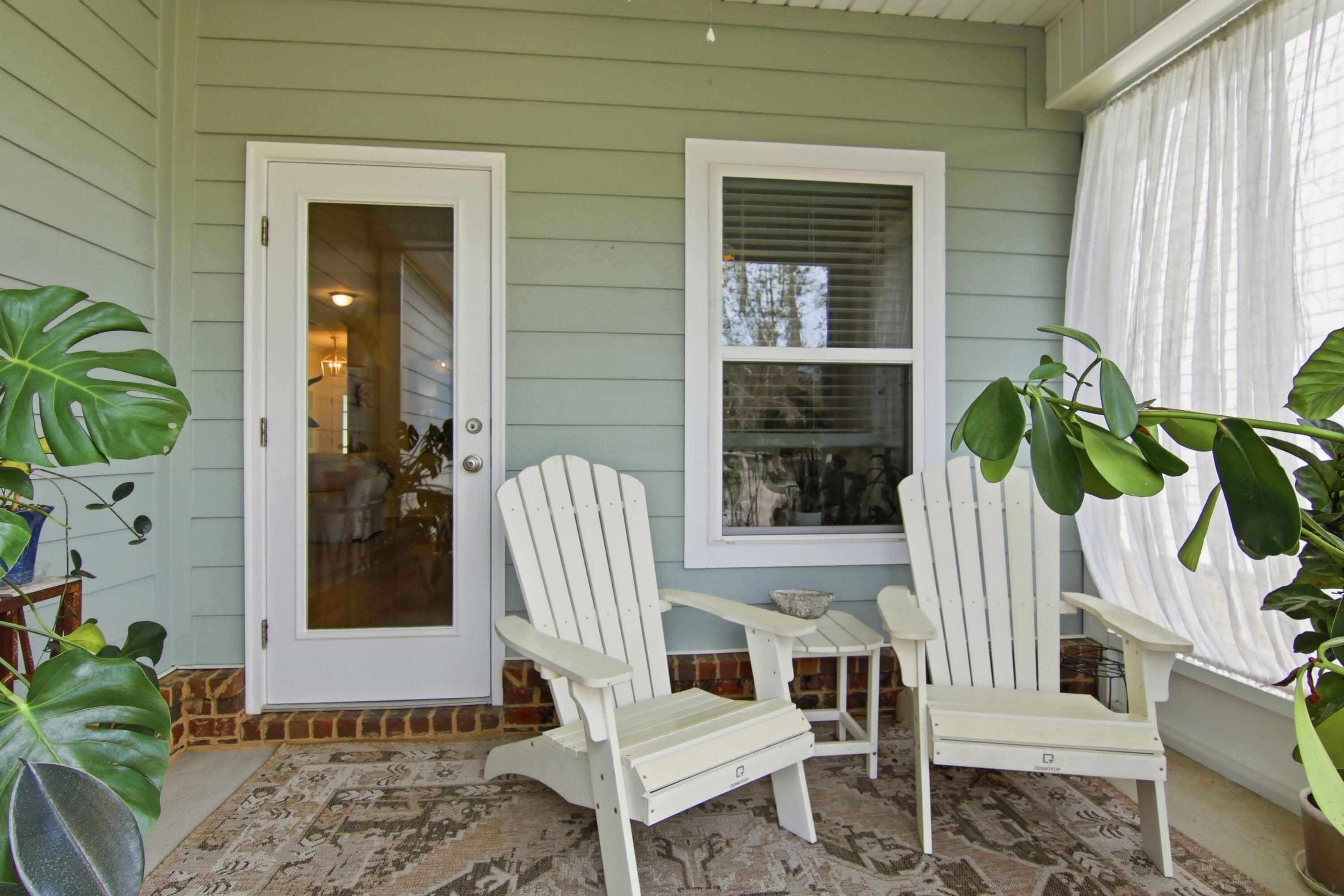 169 Marsh Landing North Freeport, FL 32439 - Photo 29 of 44 a view of balcony with two chairs and a potted plant