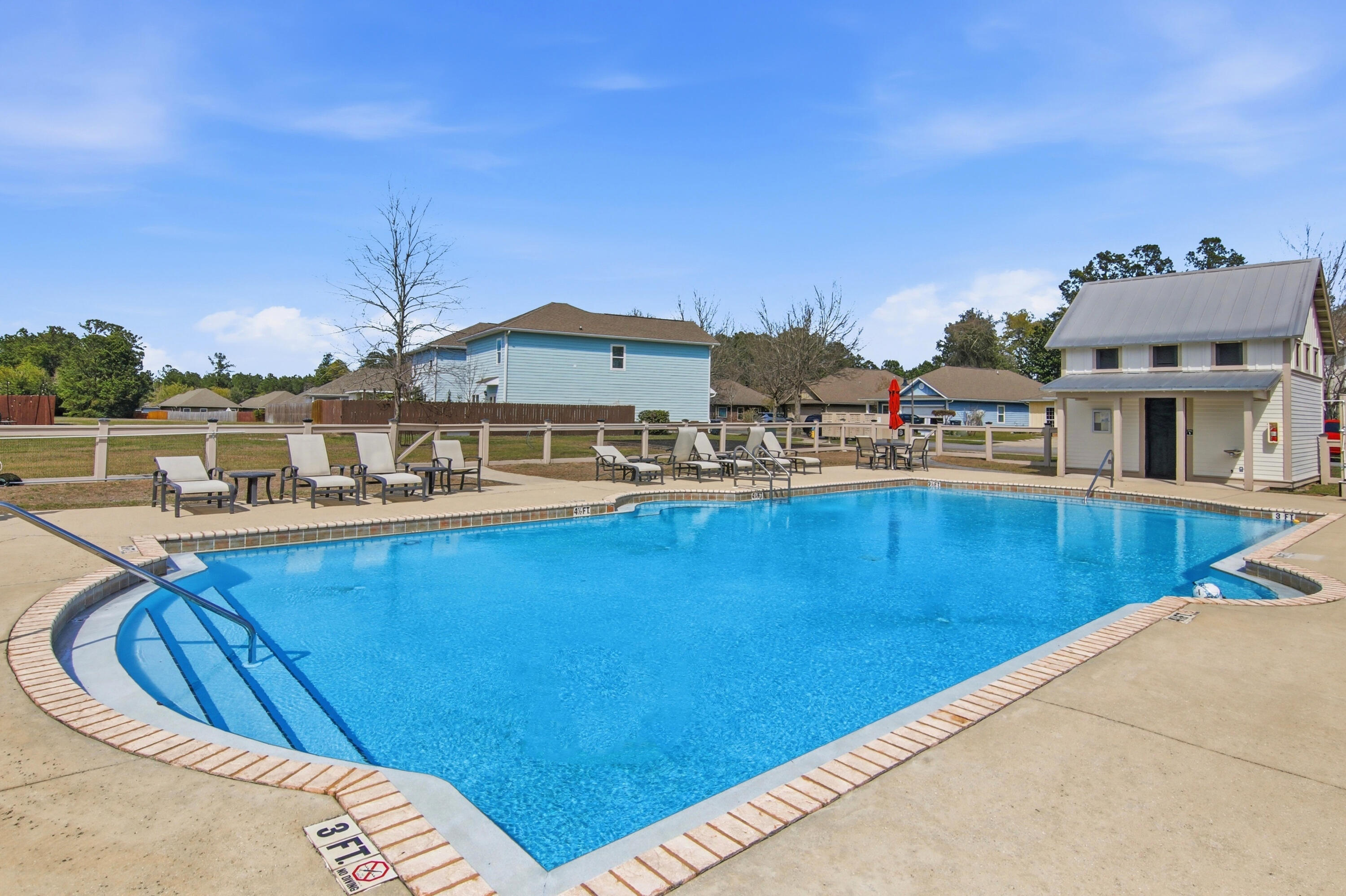 169 Marsh Landing North Freeport, FL 32439 - Photo 39 of 44 a view of a swimming pool with an outdoor seating