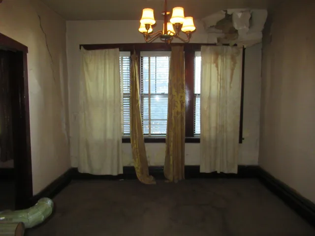 a view of livingroom with hardwood floor and a window