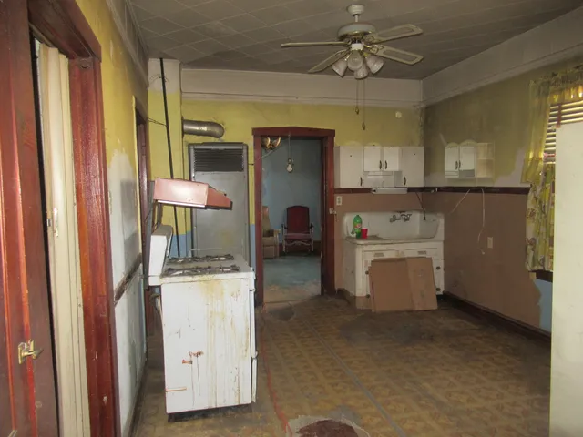 a view of a hallway with a chandelier