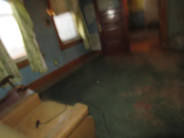 a view of a house with a large window