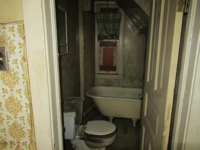 a room with furniture and a window