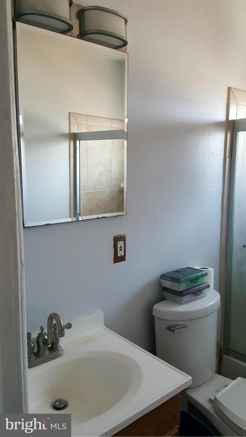 1008 Collwood Road Catonsville, MD 21228 - Photo 17 of 25 a bathroom with a sink and a toilet