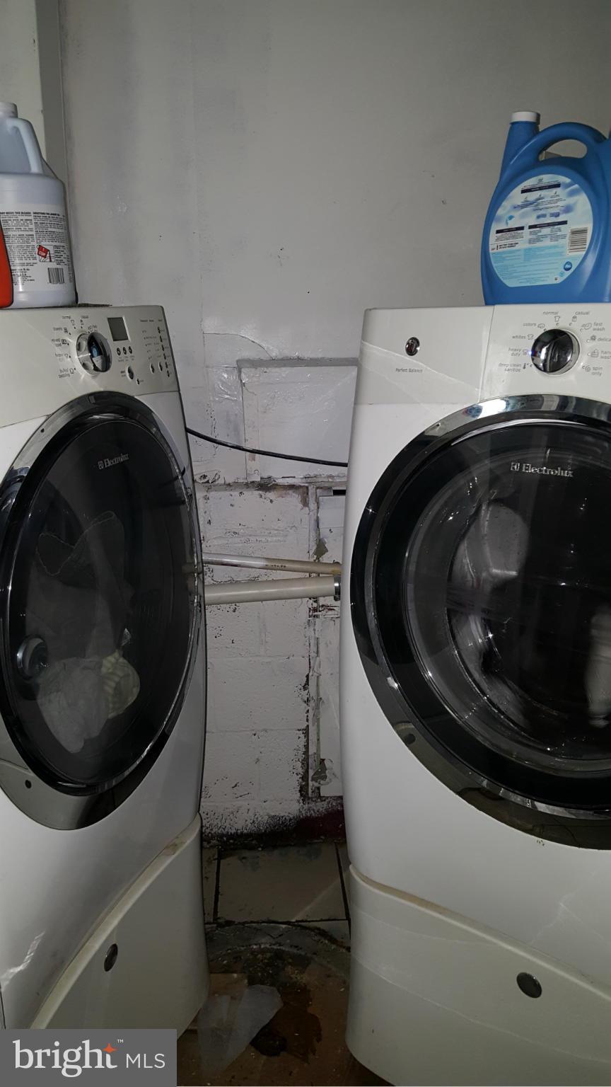 1008 Collwood Road Catonsville, MD 21228 - Photo 22 of 25 a utility room with dryer and washer