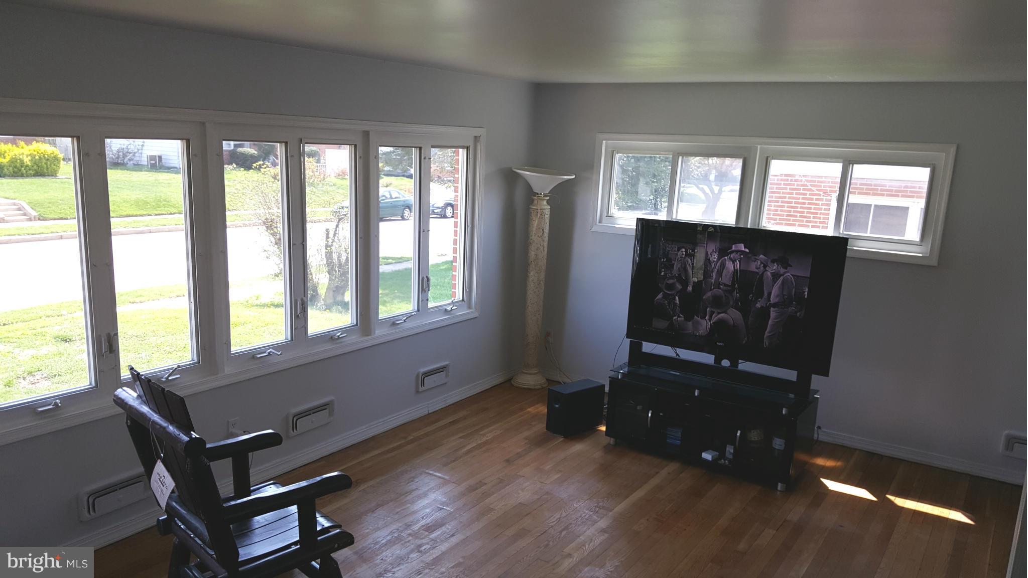 1008 Collwood Road Catonsville, MD 21228 - Photo 8 of 25 a living room with furniture and a window